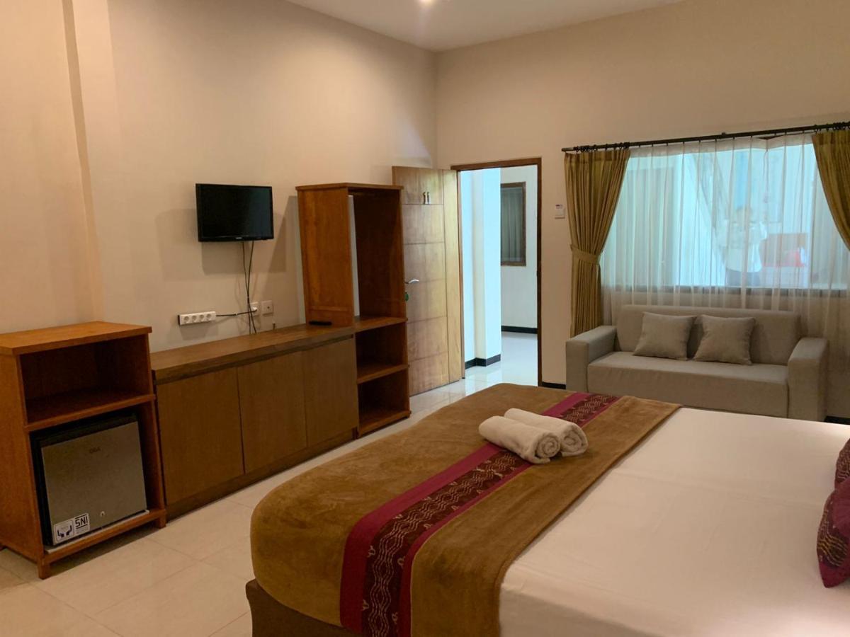 Kuta Suci Guesthouse Esterno foto