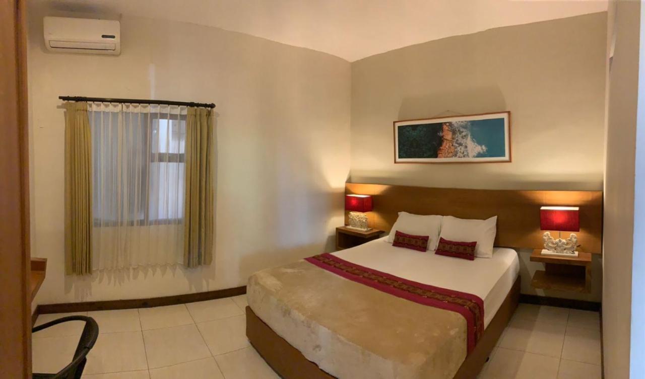 Kuta Suci Guesthouse Esterno foto
