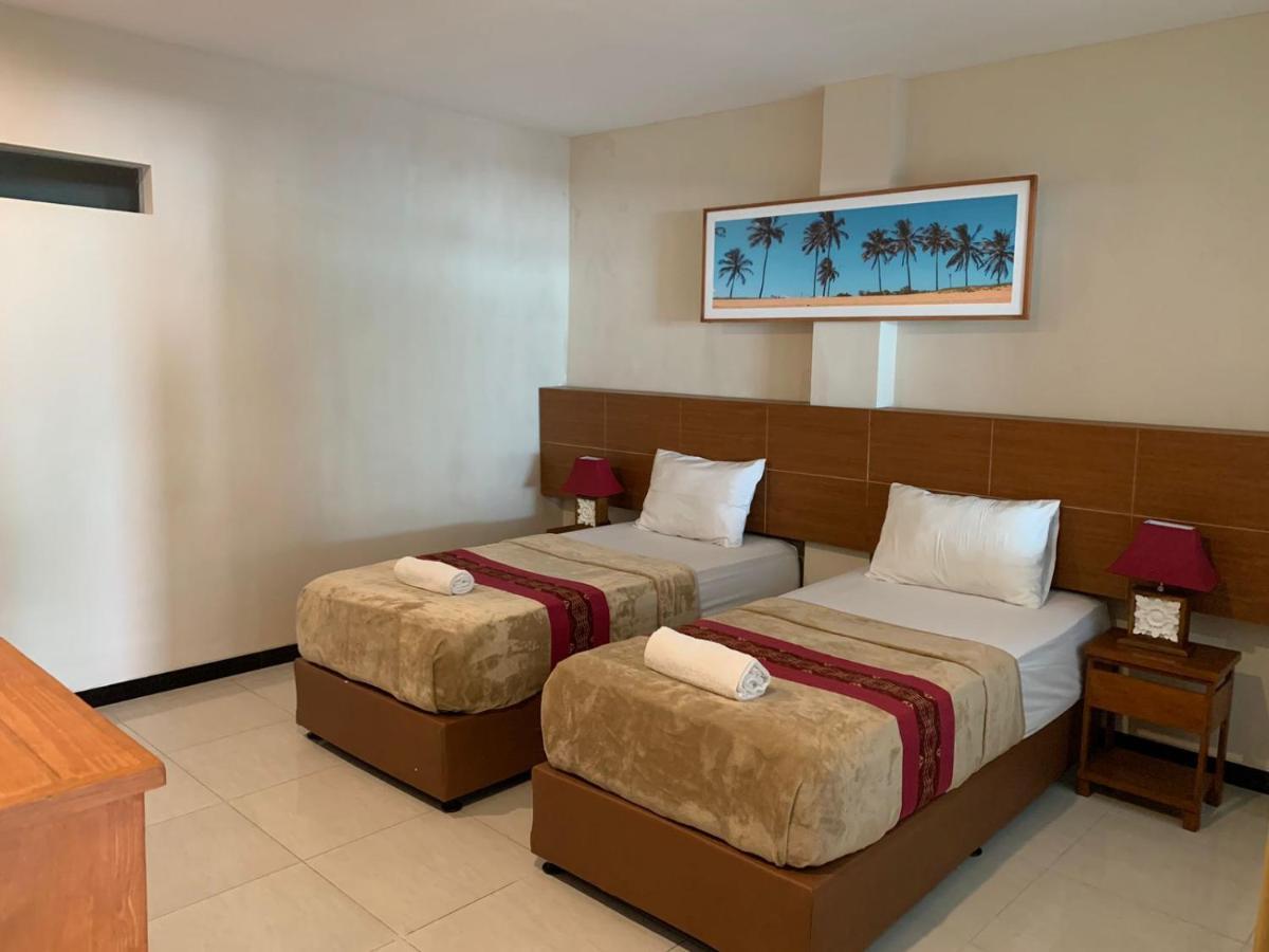 Kuta Suci Guesthouse Esterno foto