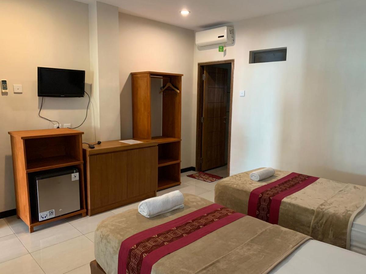 Kuta Suci Guesthouse Esterno foto
