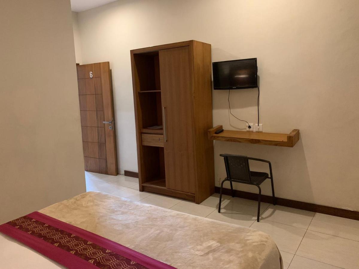 Kuta Suci Guesthouse Esterno foto