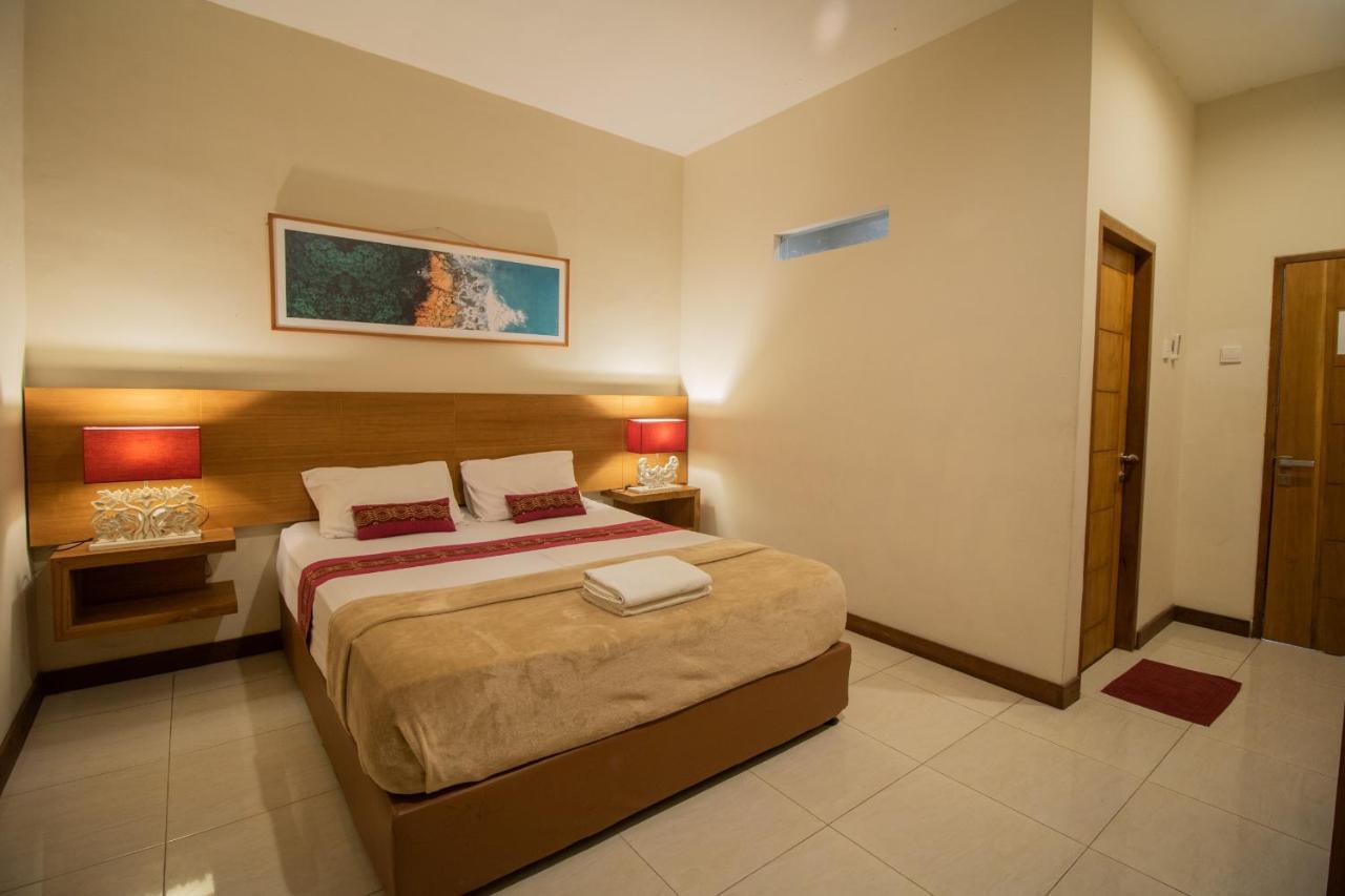 Kuta Suci Guesthouse Esterno foto
