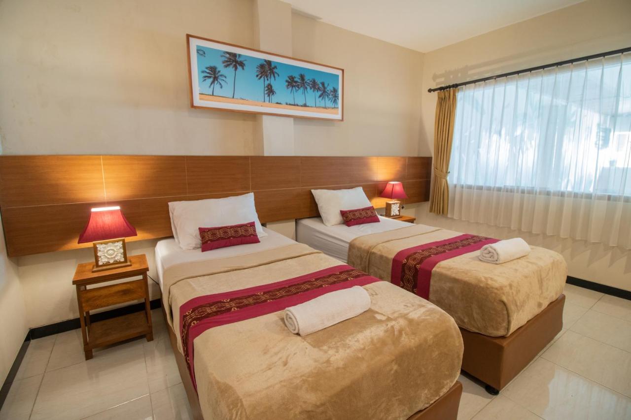 Kuta Suci Guesthouse Esterno foto
