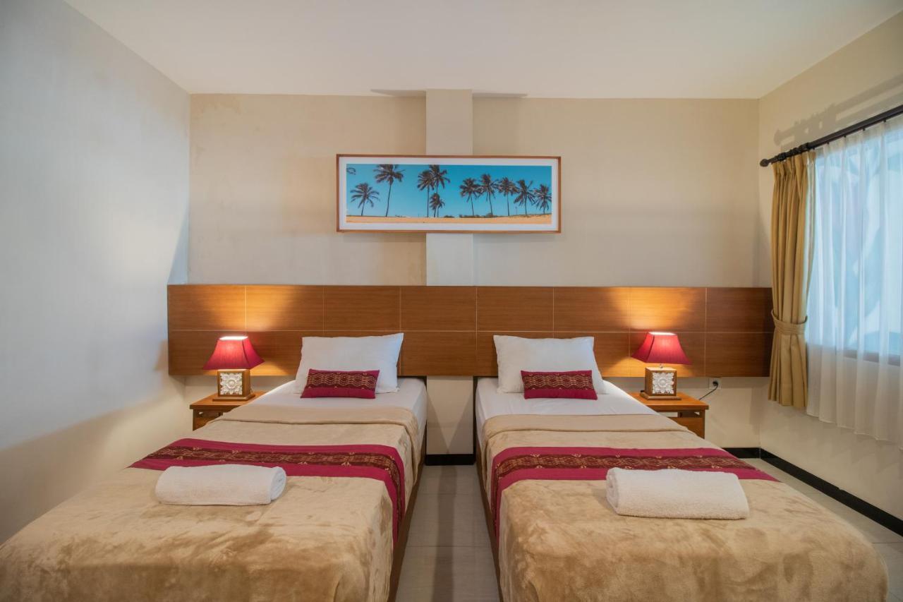 Kuta Suci Guesthouse Esterno foto
