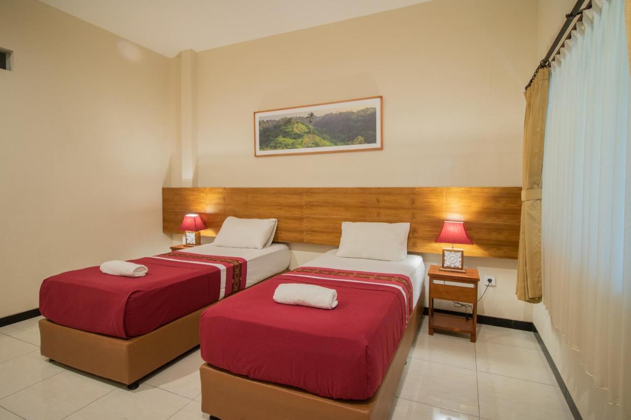 Kuta Suci Guesthouse Esterno foto
