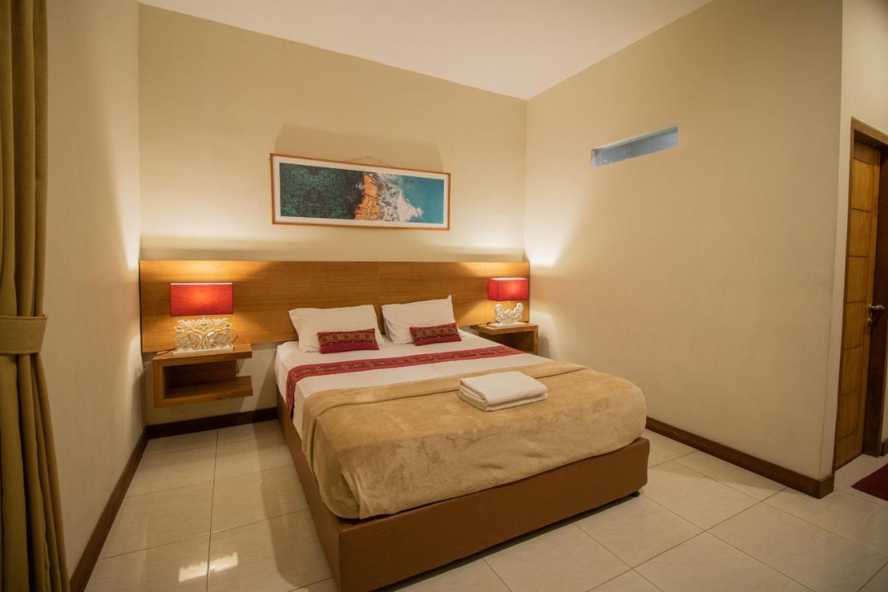 Kuta Suci Guesthouse Esterno foto