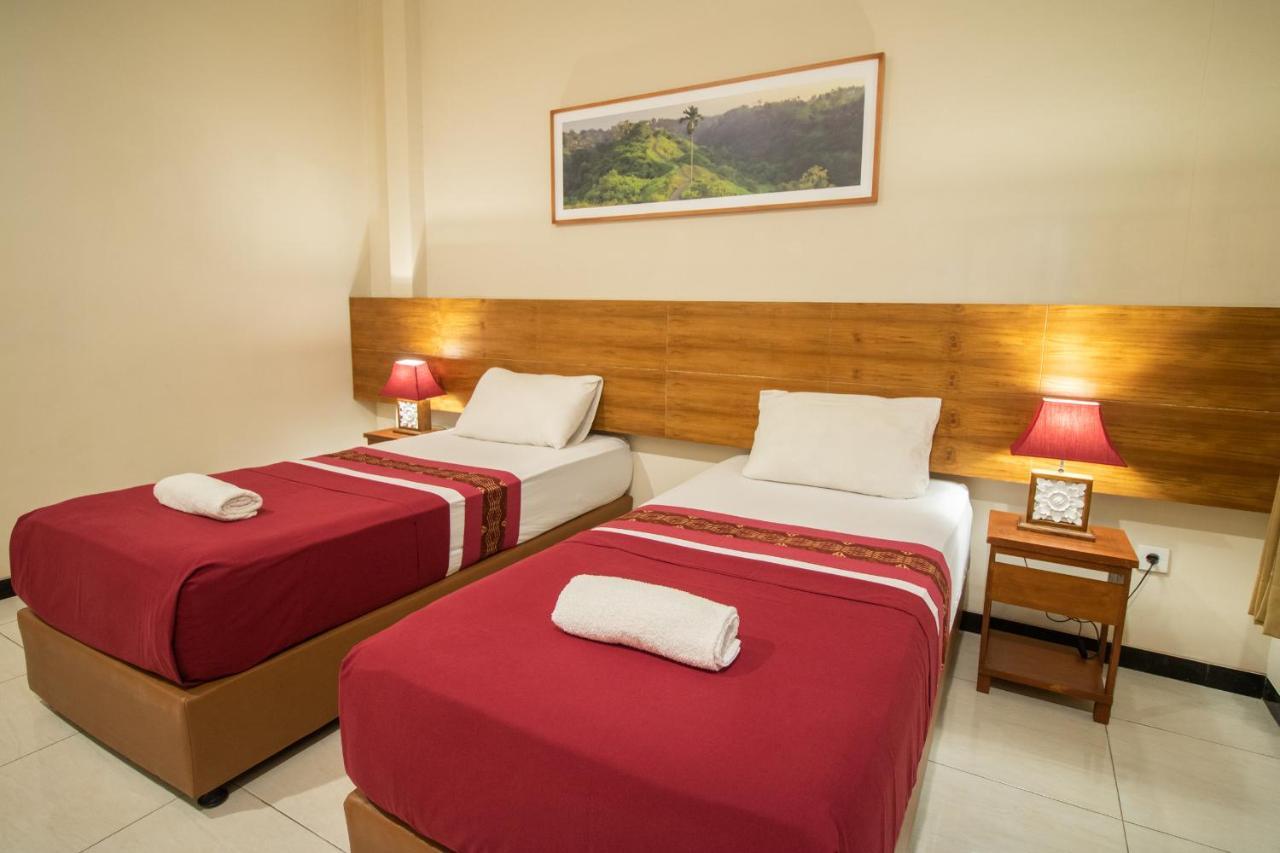 Kuta Suci Guesthouse Esterno foto