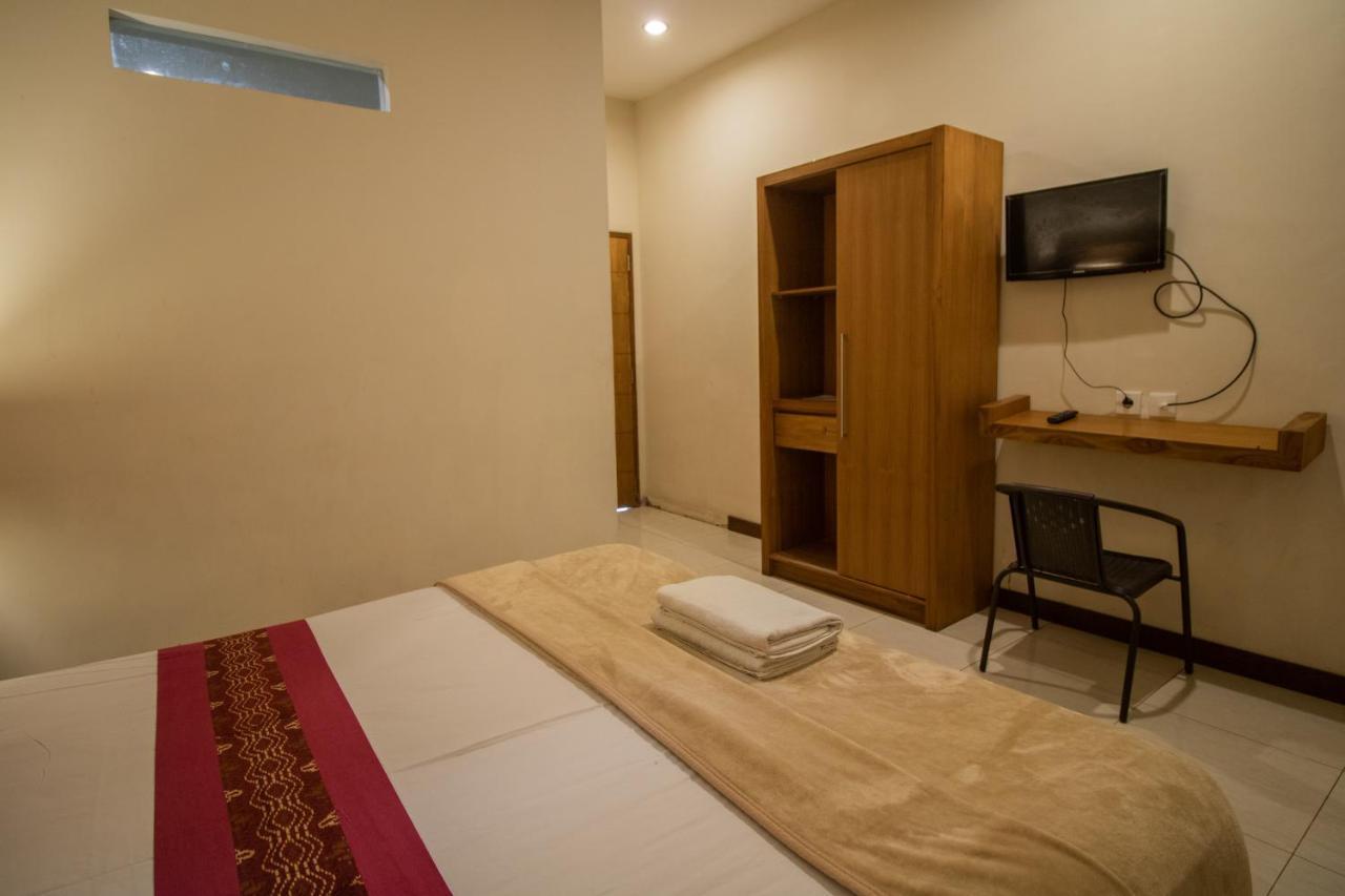 Kuta Suci Guesthouse Esterno foto