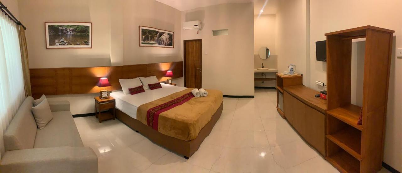Kuta Suci Guesthouse Esterno foto