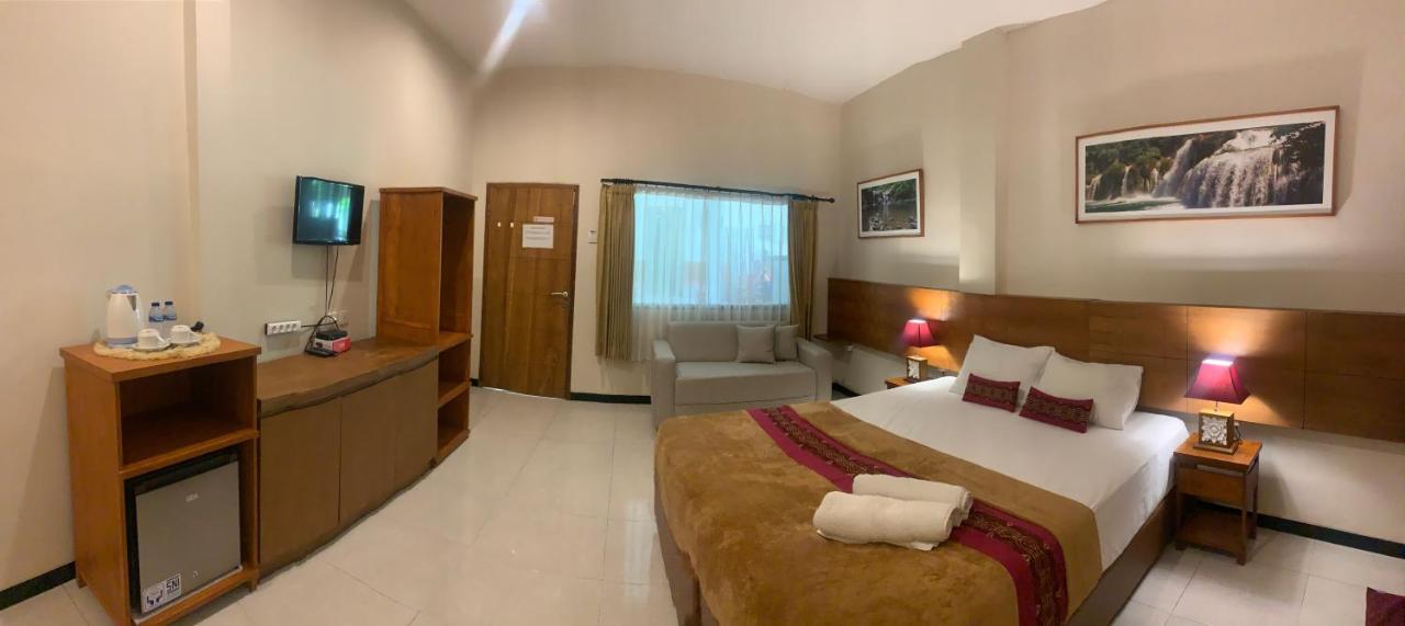 Kuta Suci Guesthouse Esterno foto