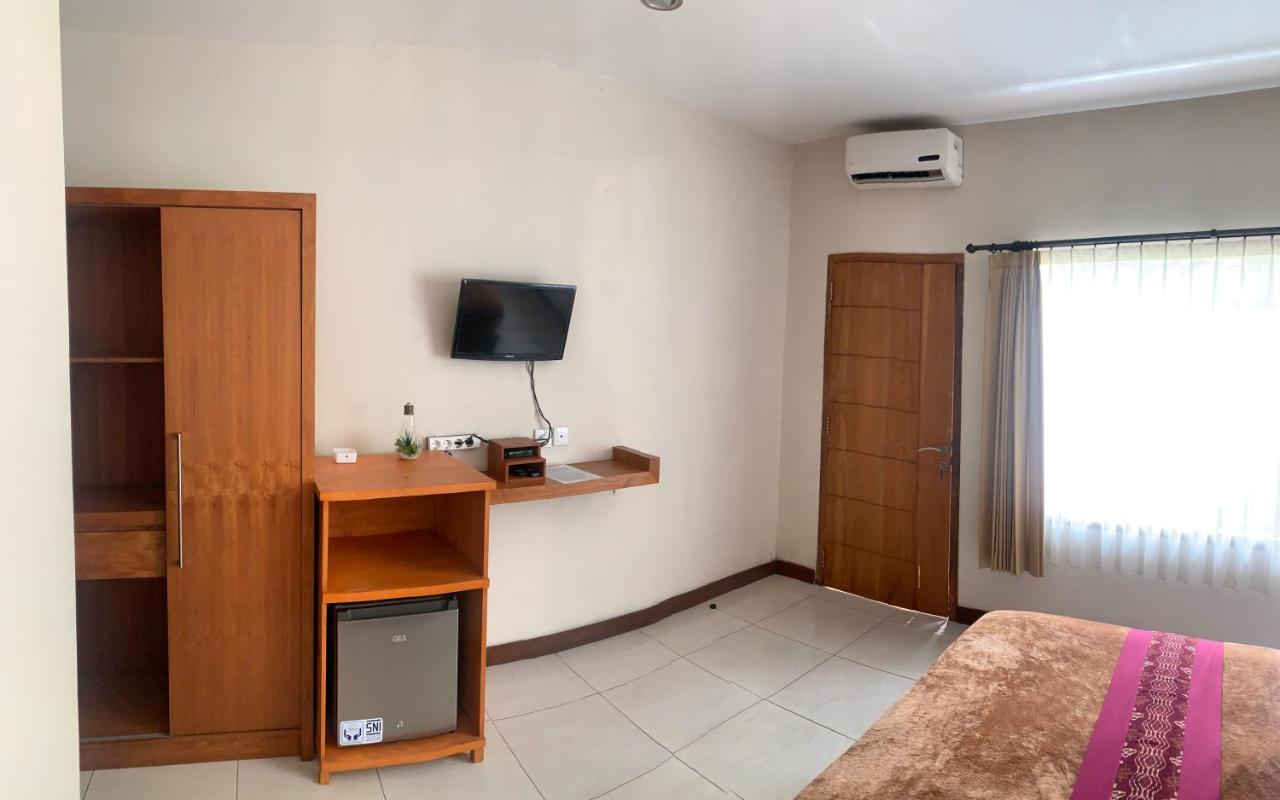 Kuta Suci Guesthouse Esterno foto