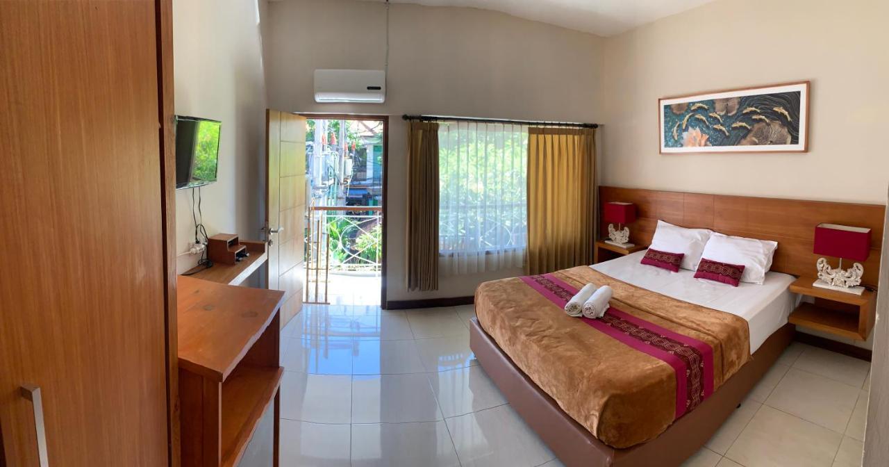 Kuta Suci Guesthouse Esterno foto