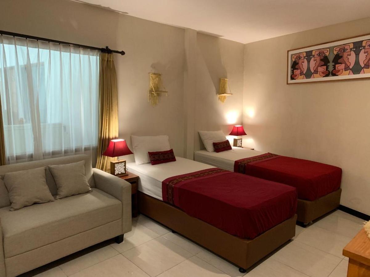 Kuta Suci Guesthouse Esterno foto