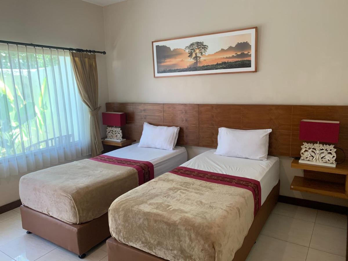 Kuta Suci Guesthouse Esterno foto
