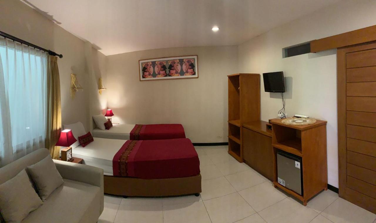 Kuta Suci Guesthouse Esterno foto