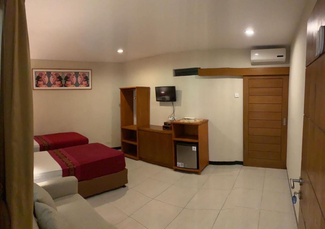 Kuta Suci Guesthouse Esterno foto