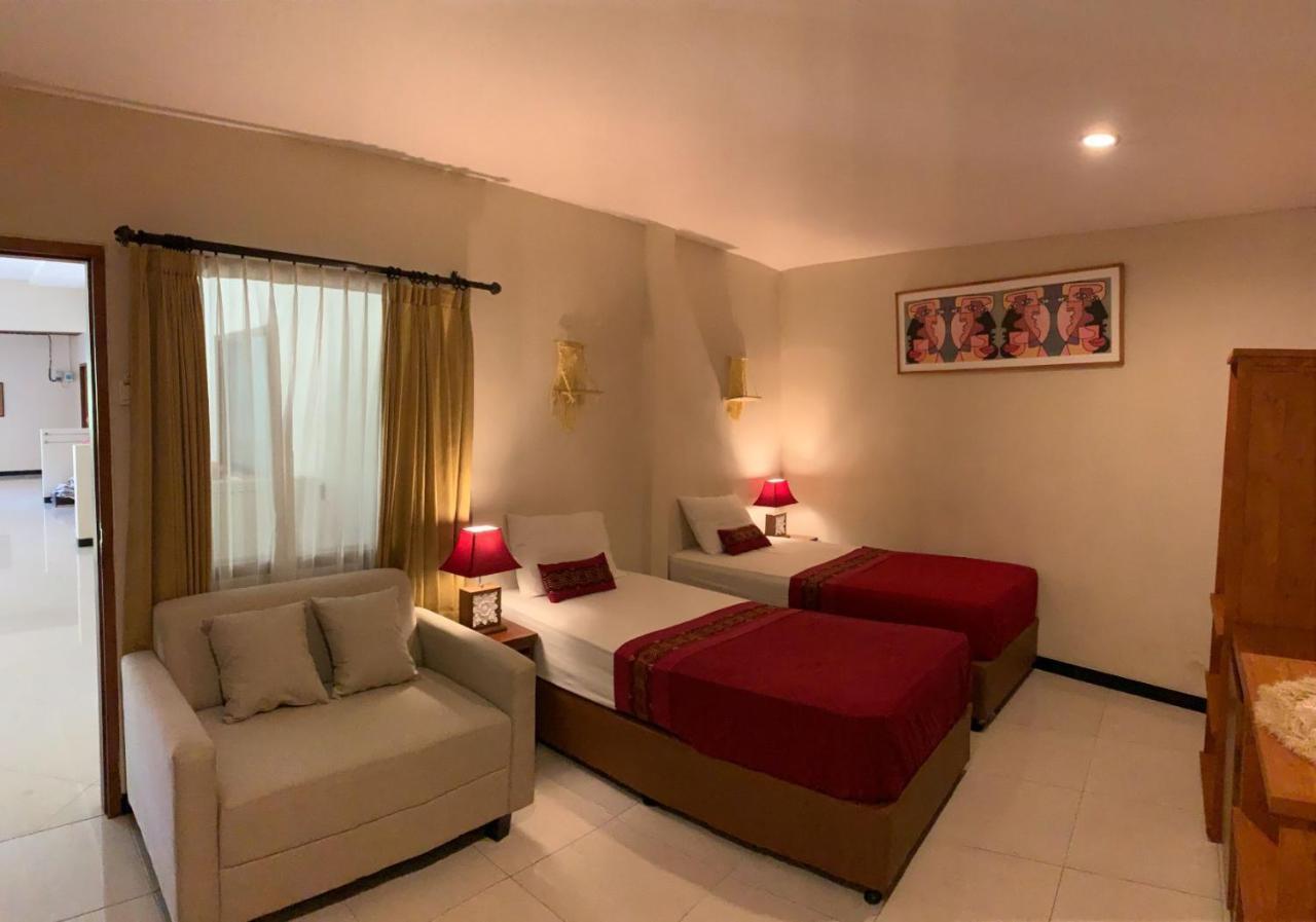 Kuta Suci Guesthouse Esterno foto