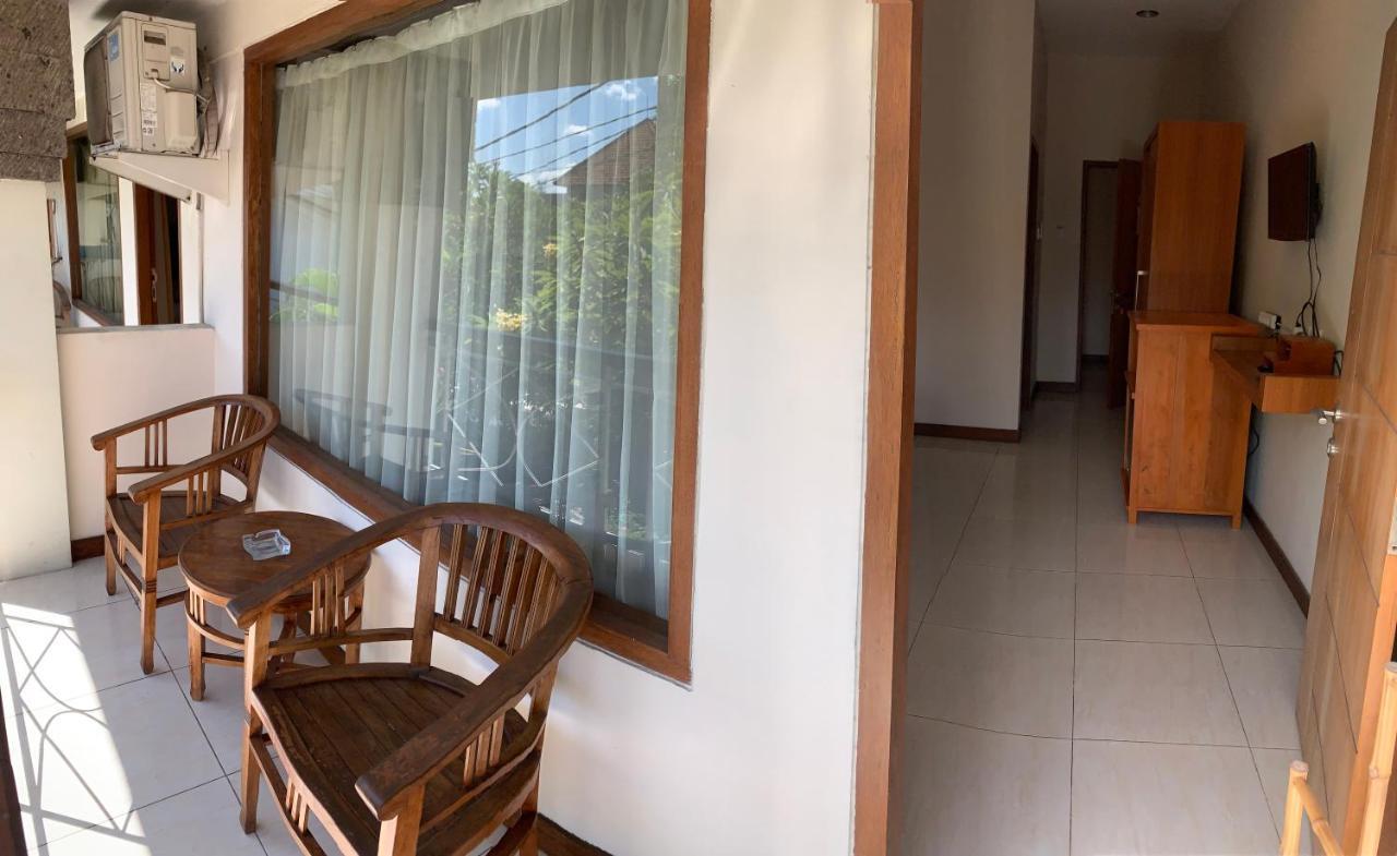Kuta Suci Guesthouse Esterno foto