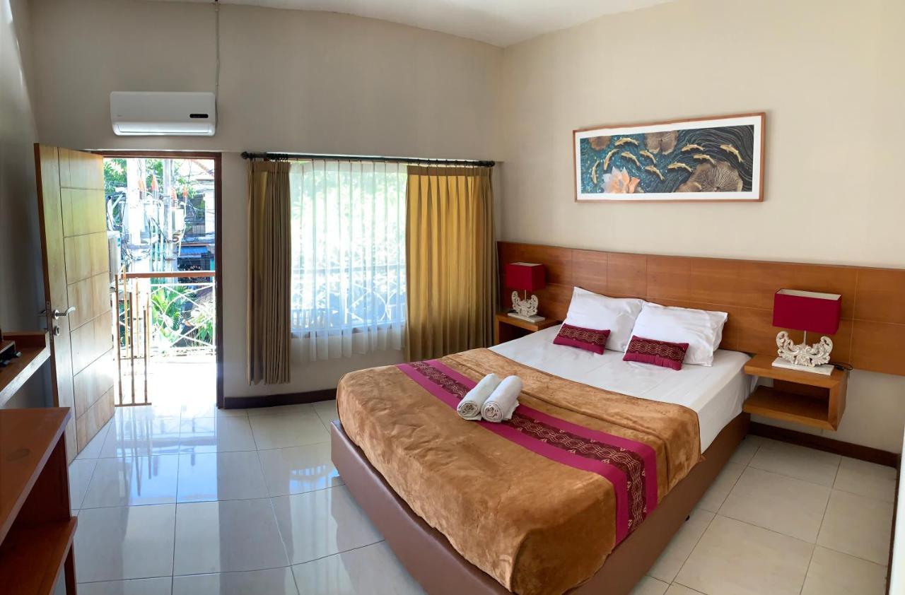 Kuta Suci Guesthouse Esterno foto