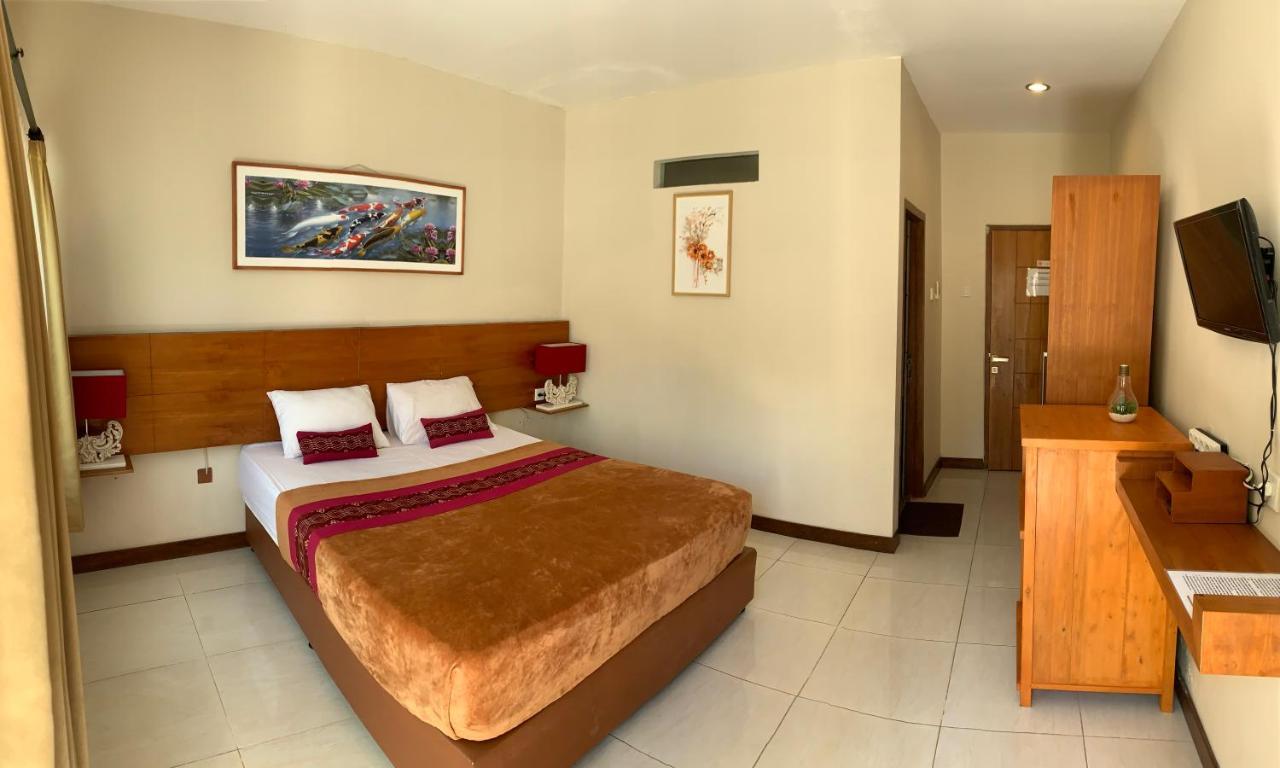 Kuta Suci Guesthouse Esterno foto
