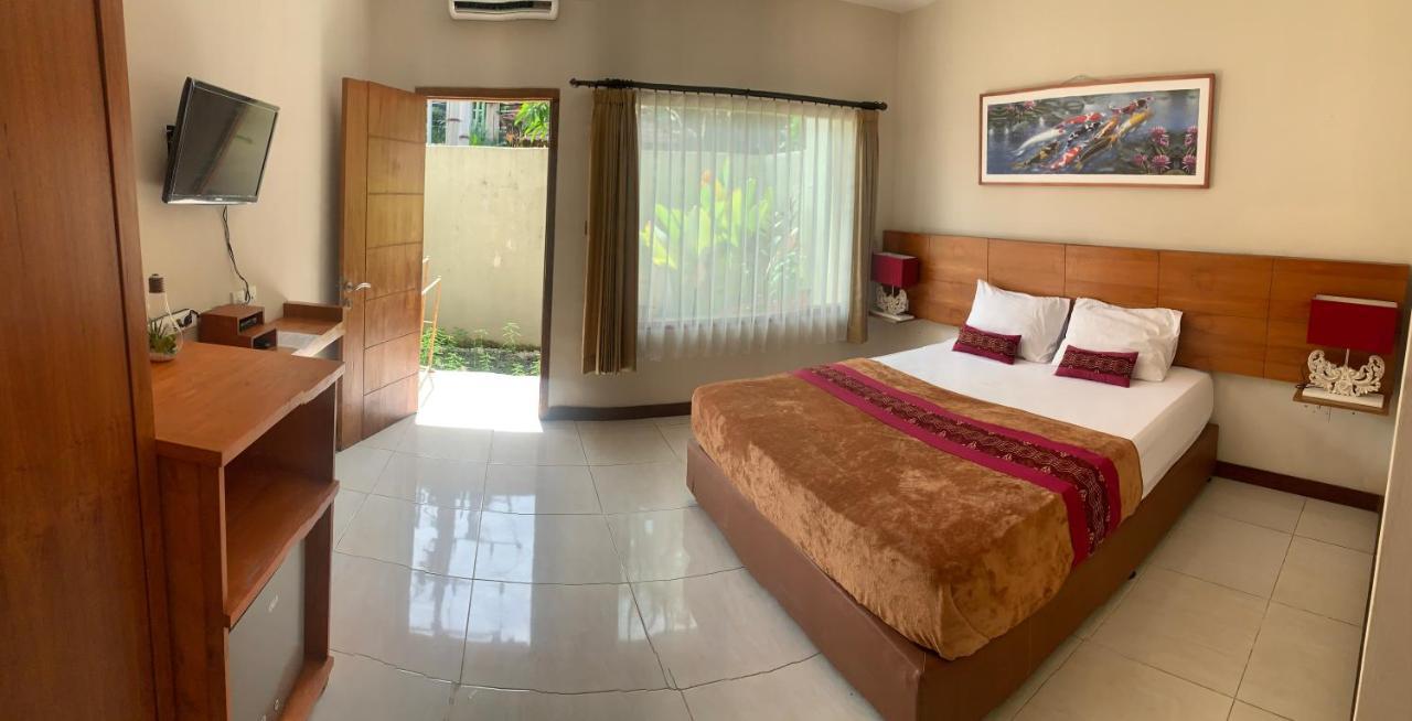 Kuta Suci Guesthouse Esterno foto