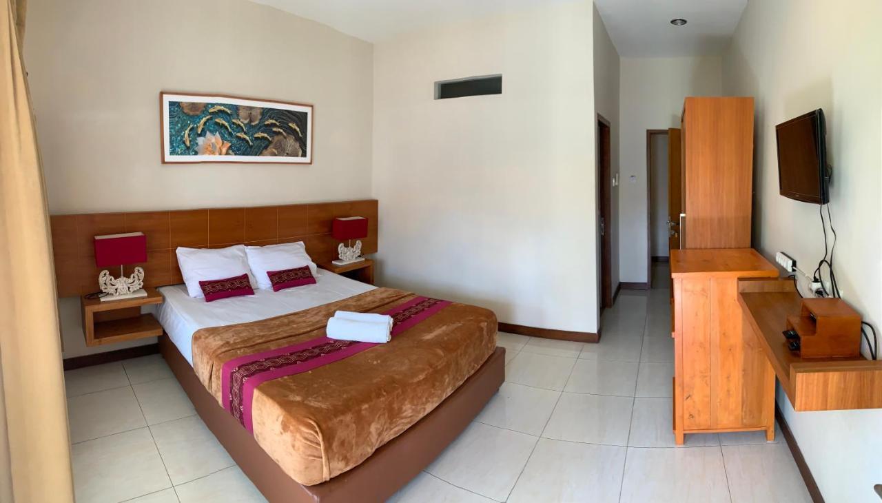 Kuta Suci Guesthouse Esterno foto