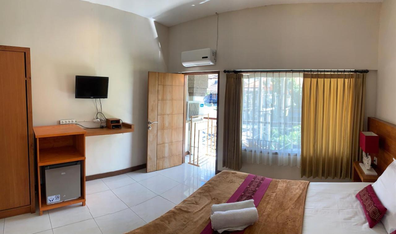 Kuta Suci Guesthouse Esterno foto