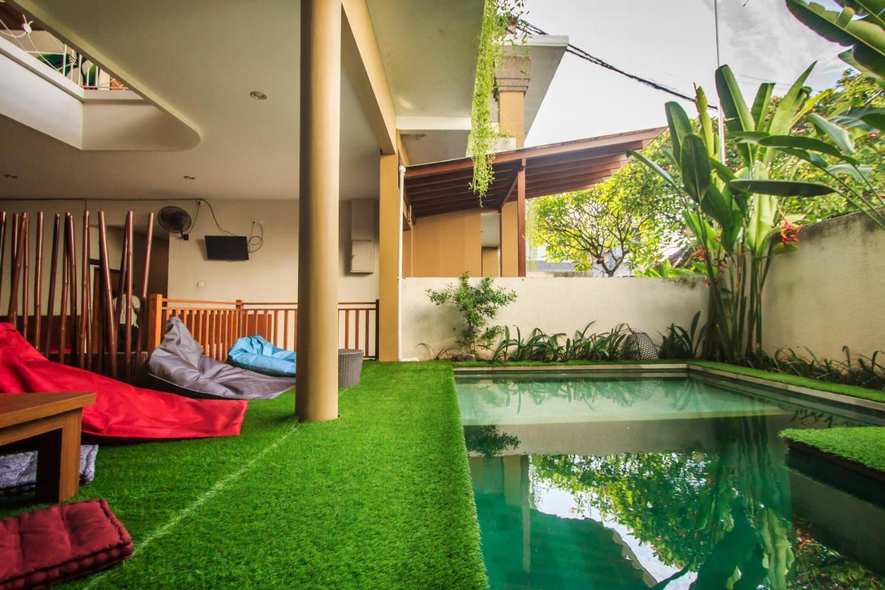 Kuta Suci Guesthouse Esterno foto