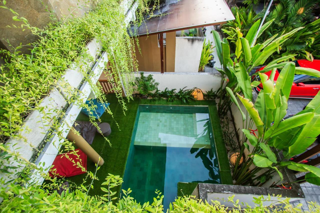 Kuta Suci Guesthouse Esterno foto